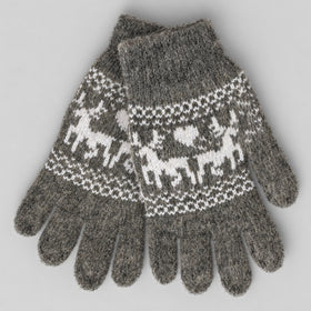 A pair of heather gray knit gloves featuring a white Fair Isle pattern of reindeer and geometric motifs across the back of the hands, displayed on a neutral gray background.