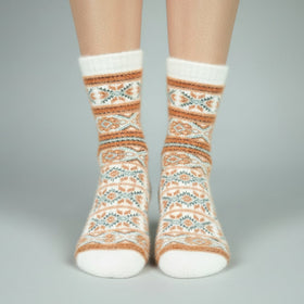 Pair of patterned socks on a neutral background