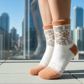 Person wearing white socks with brown accents in a cityscape setting