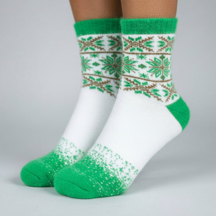 White socks with green and brown pattern worn on a gray background