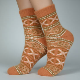 Pair of patterned brown socks on a neutral background