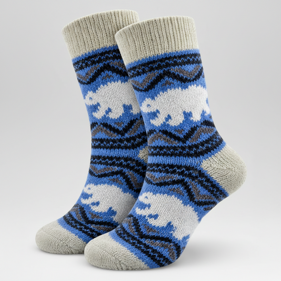Pair of socks with bear pattern on a light grey background