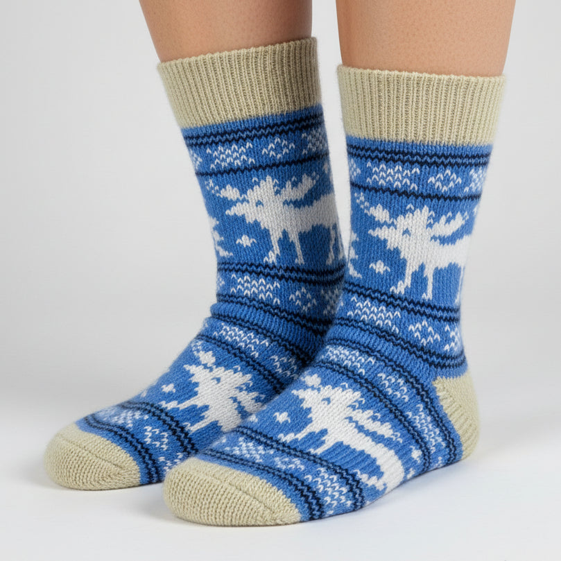 Knitted sock with moose design on a white background