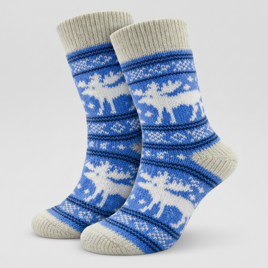 Pair of blue and gray socks with moose pattern on a light grey background