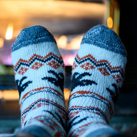 Pair of patterned socks with a blurred background