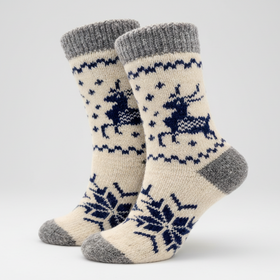 Pair of socks with reindeer pattern on a white background