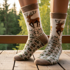 Sock with deer design on a white background