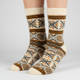 Knitted sock with a pattern on a white background