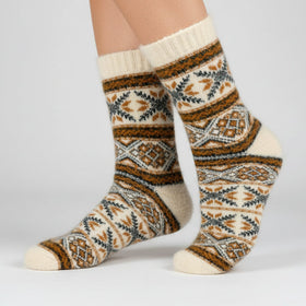 Knitted sock with a pattern on a white background
