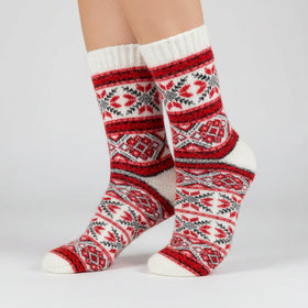 Red and white patterned sock on a white background