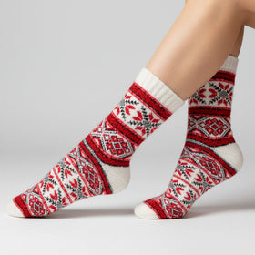 Red and white patterned sock on a white background