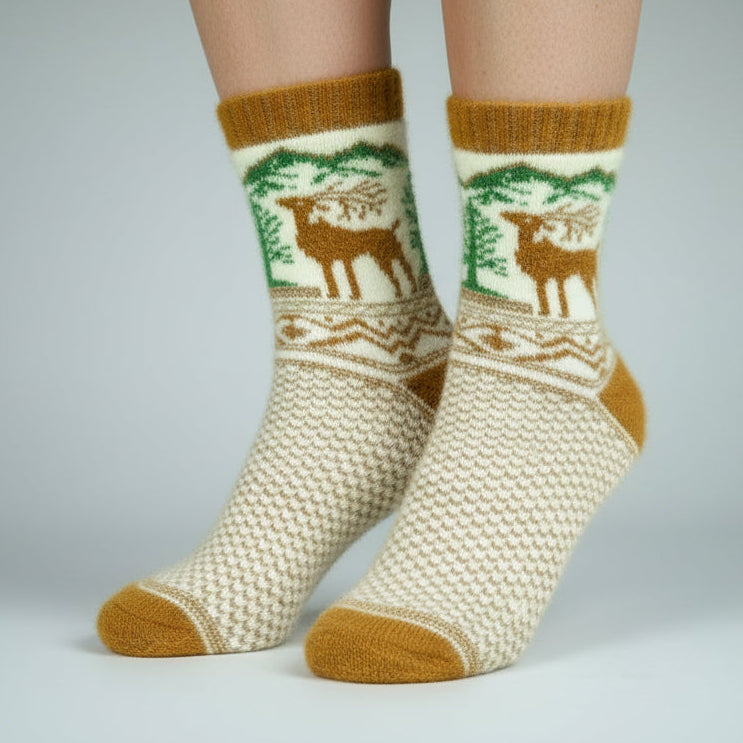 Pair of socks with deer design on a neutral background
