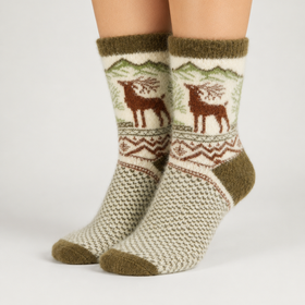 Knitted socks with deer design on a plain background