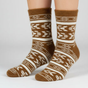 Brown and white patterned sock on a white background