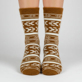 Brown and white patterned sock on a white background
