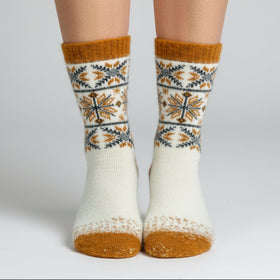 White sock with orange accents and a pattern on a white background