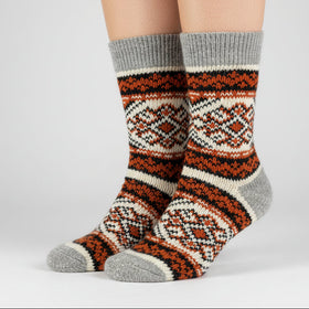 Knitted sock with a pattern on a white background