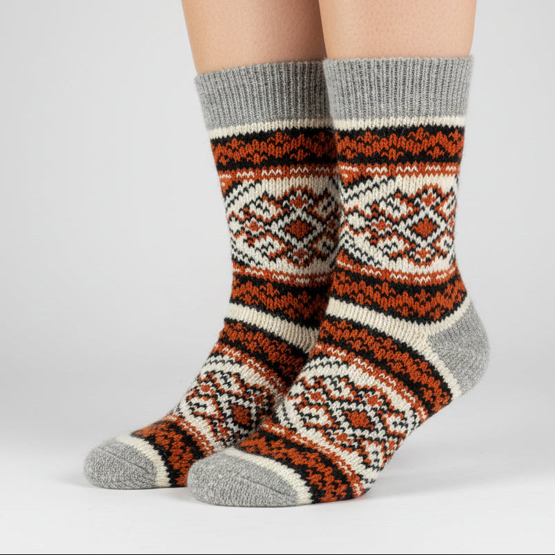 Knitted sock with a pattern on a white background