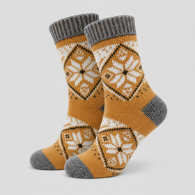 Pair of orange and gray patterned socks on a light grey background