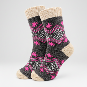 Pair of gray socks with pink patterns on a white background