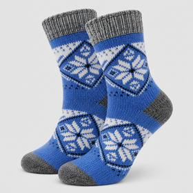 Pair of blue socks with snowflake pattern and gray cuffs and toes on a white background